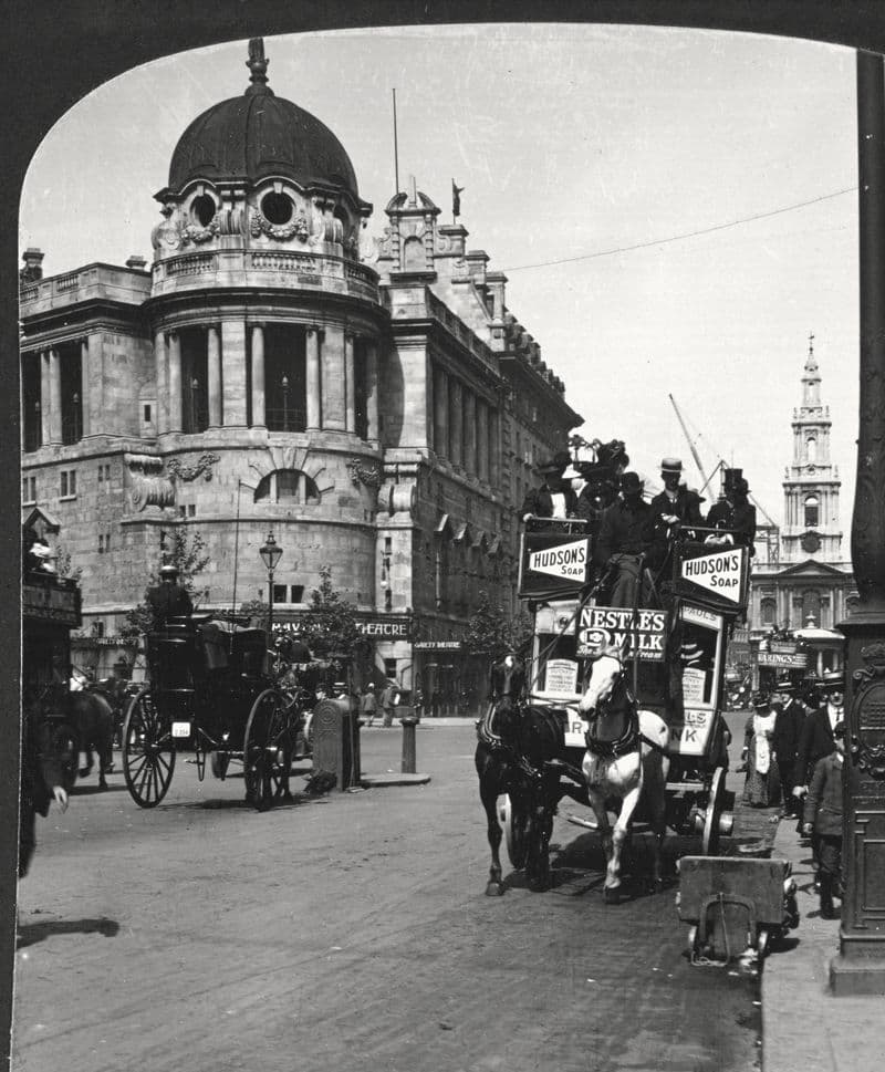 The domed New Gaiety Theatre on the Strand with a horse-drawn omnibus passing, 1903.