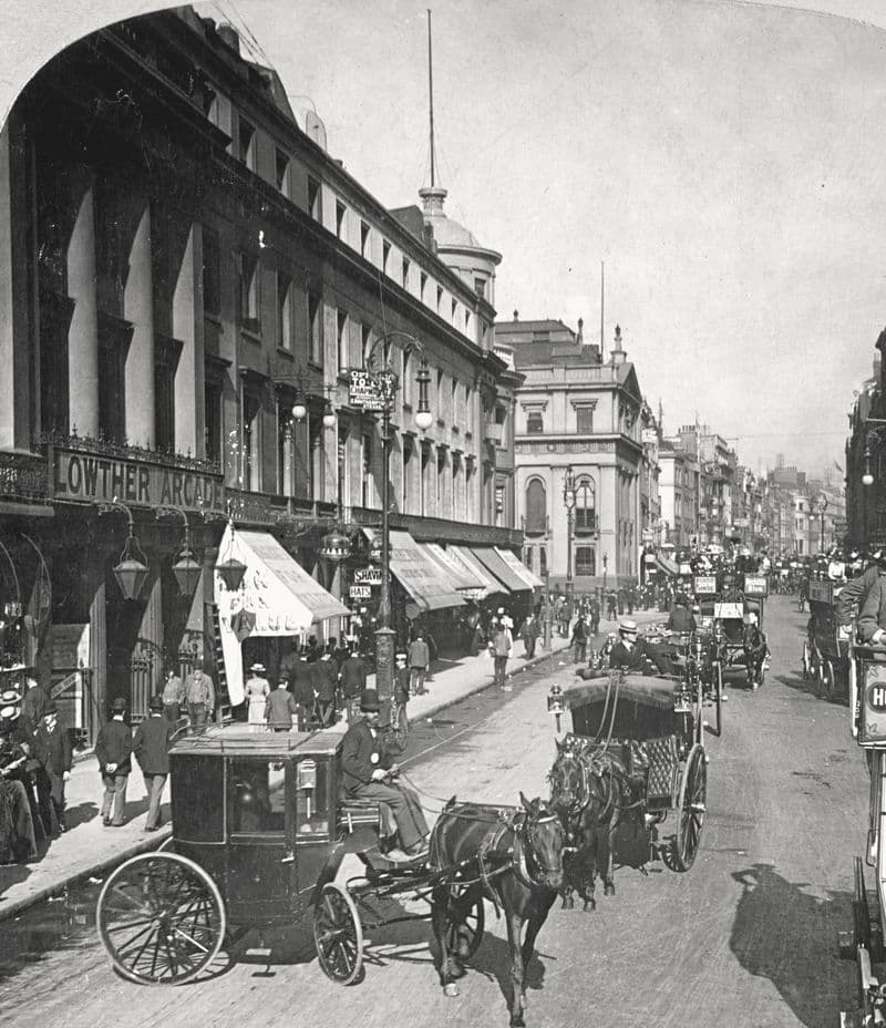 The Strand at Lowther Arcade with gas lanterns and hansom traffic, 1901.